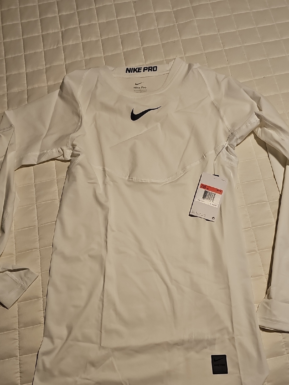 Nike White Long Sleeve Compression Top with Black Swoosh